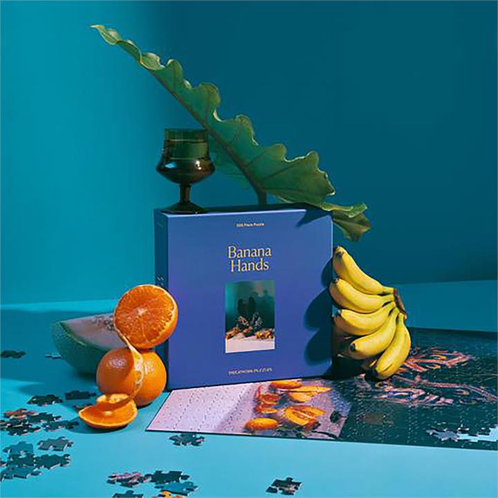 Piecework Puzzles Banana Hands 500 Piece Puzzle